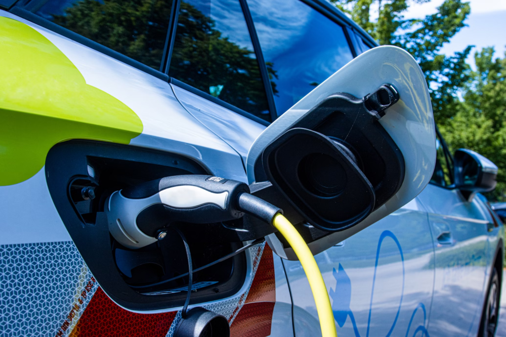 A Deep Dive into the Evolution and Impact of EV Charging Stations