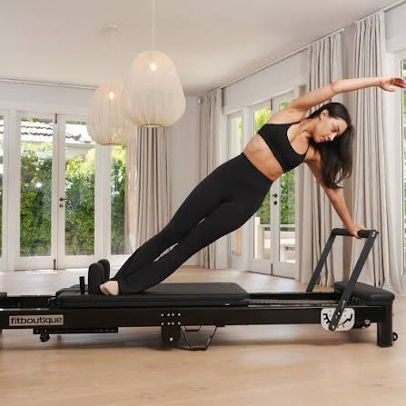 A Reformer Pilates Machine Can Turn A Small Space Into A Versatile Home Gym